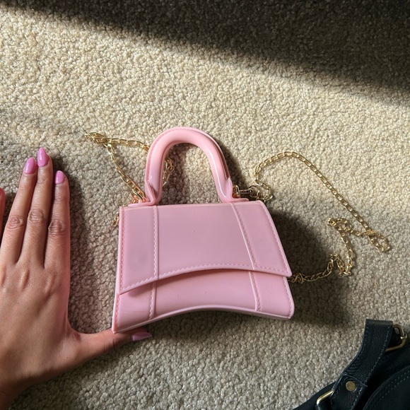 Never used - Mini, rubberized sling bag - Picture 2 of 3